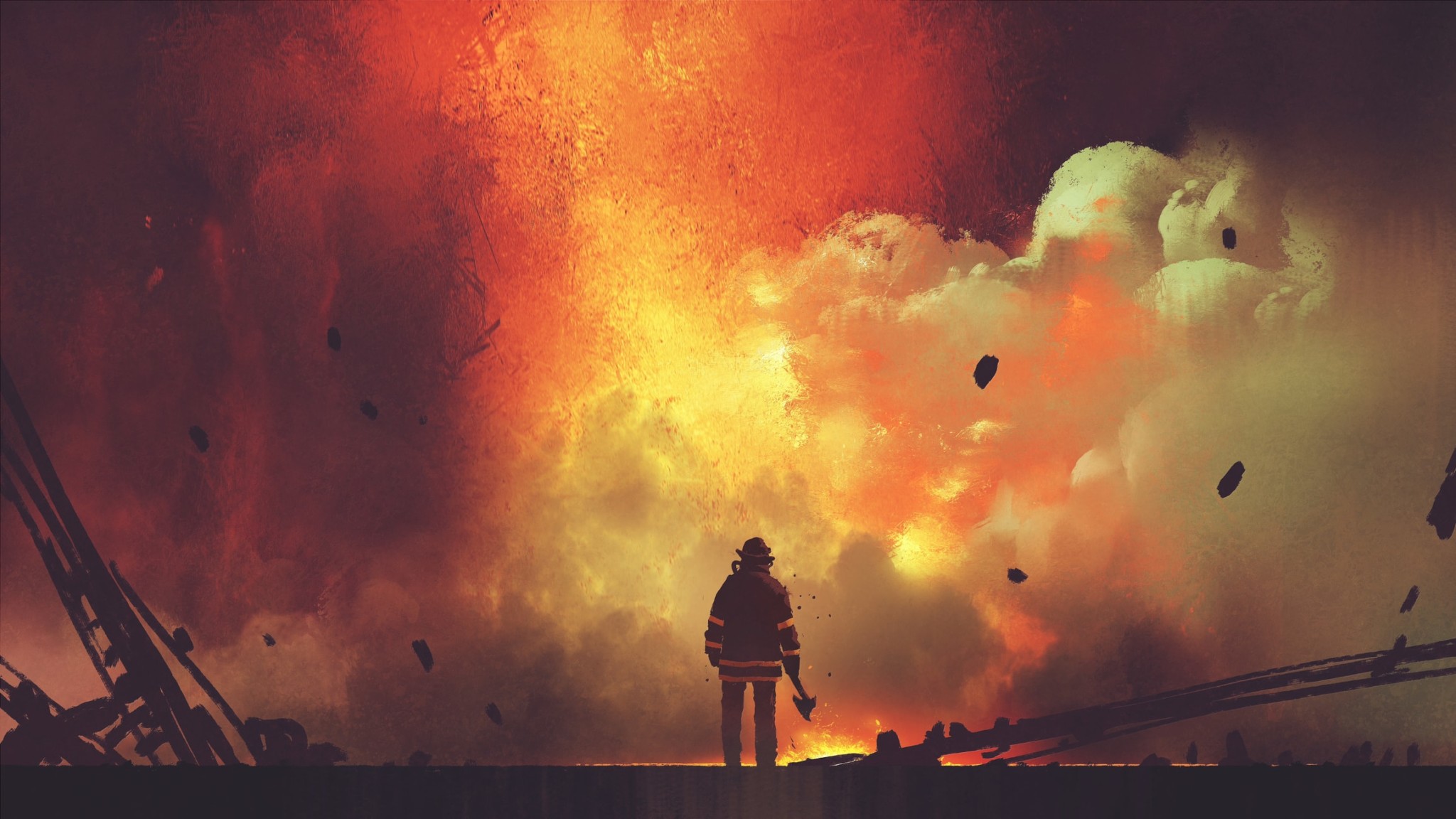 insurance for first responders, firefighter stands in front of a very large fire