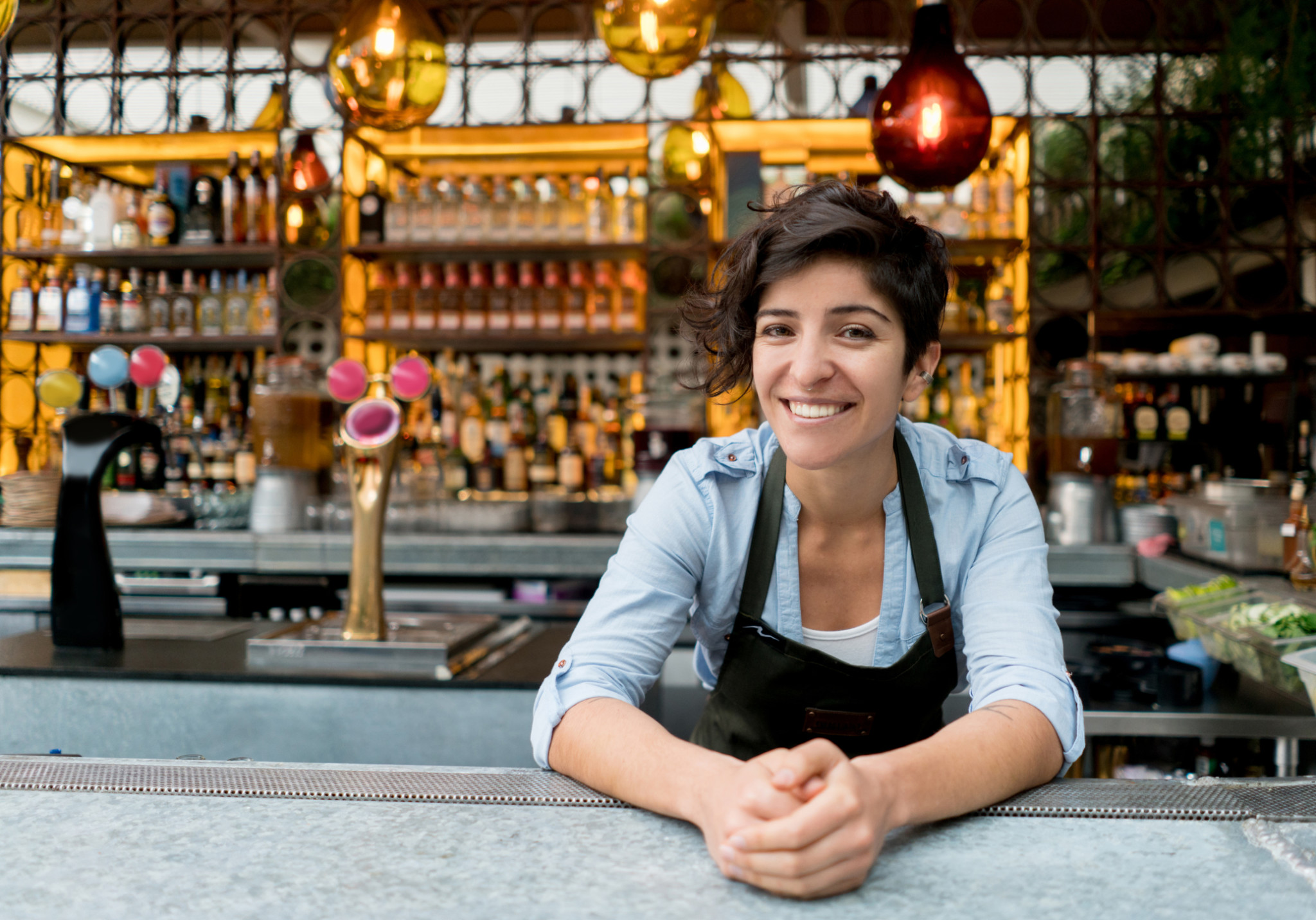 bartender in front of bar
