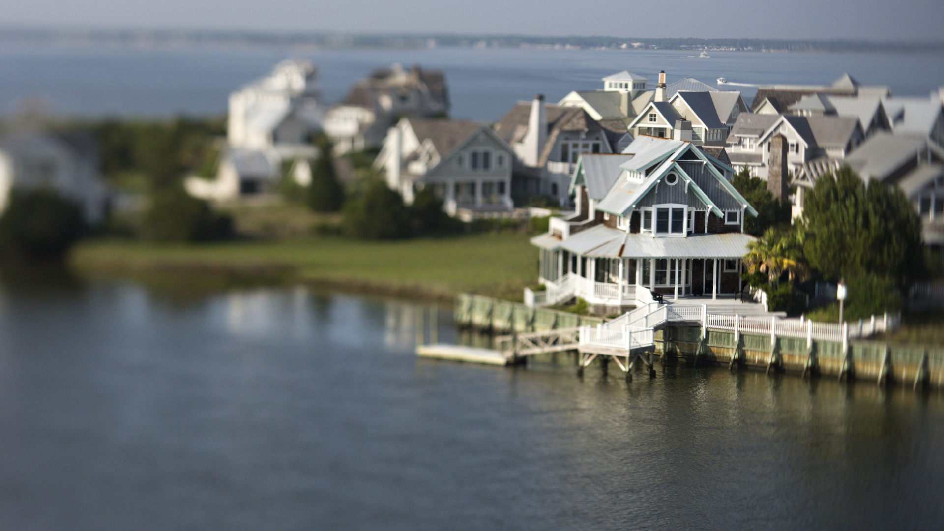 TRU Umbrella insurance solutions featuring a house on the water